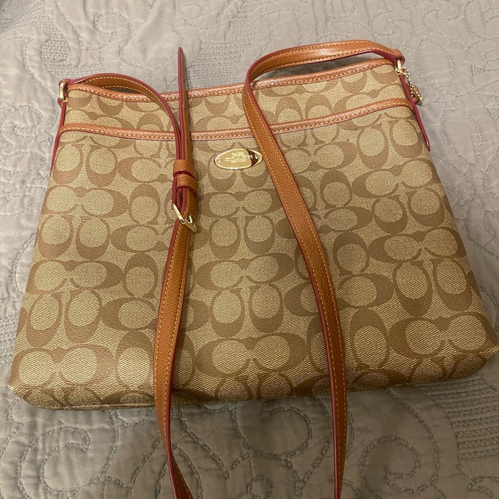 Coach leather monogram shoulder/crossbody bag.